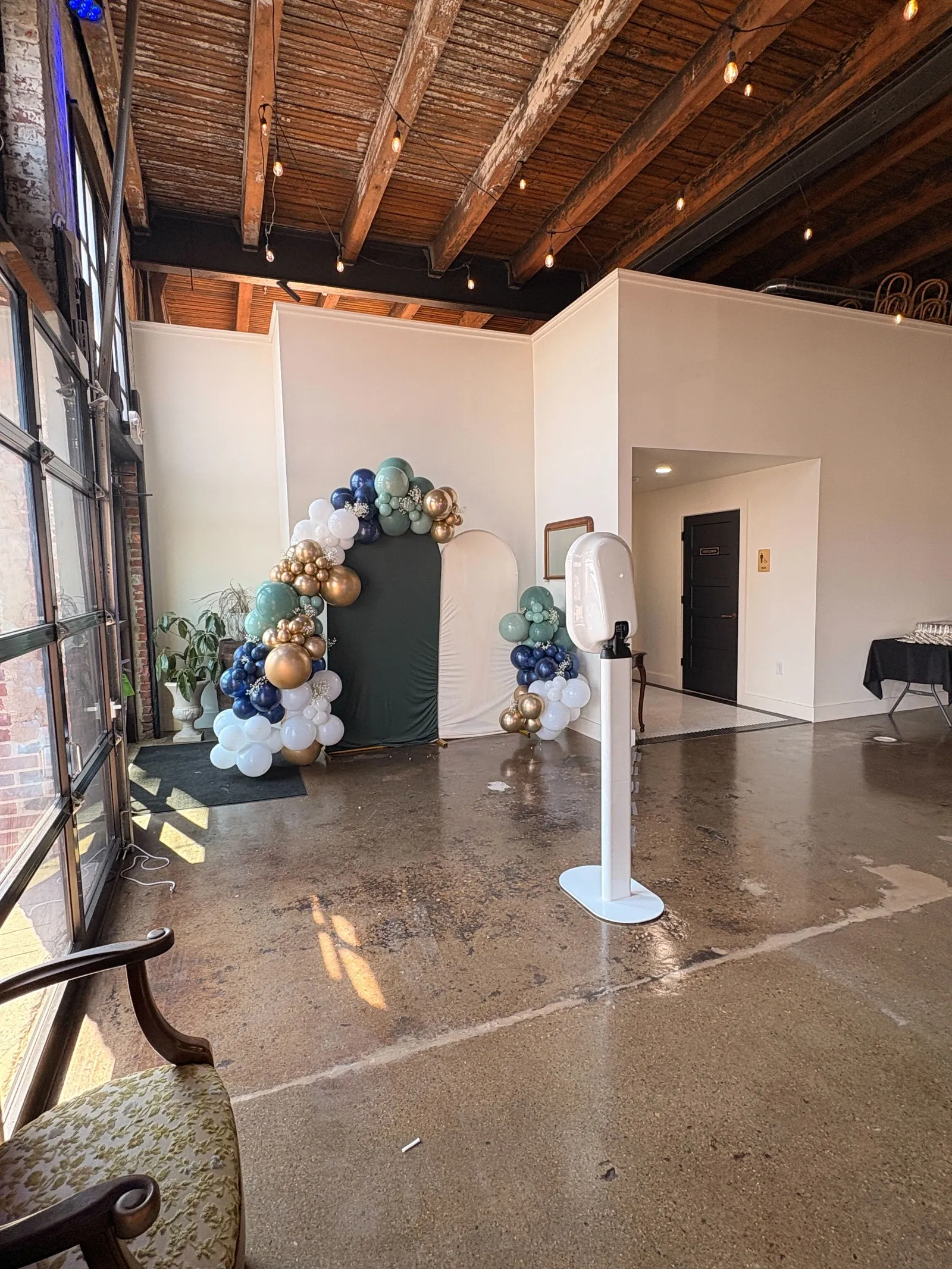 24 Shelby venue interior with Edison string lights and exposed brick